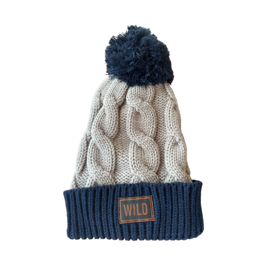 STONE AND NAVY POM POM BEANIE WILD LEATHER PATCH